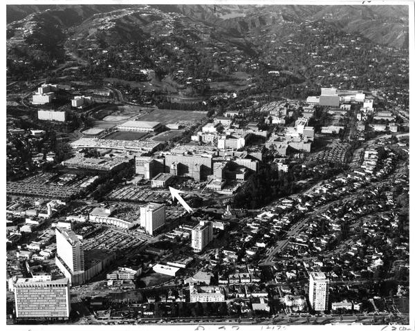 Aerial view of University of California, Los Angeles, Westwood Village, Bel Air, Jules Stein Eye Institute, UCLA Center for Health Sciences, ca. 1975