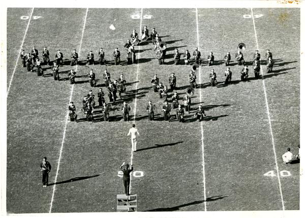 View of marching band performing and forming star shape