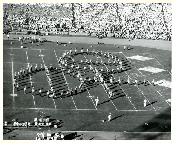 UCLA Marching band performing and forming shape