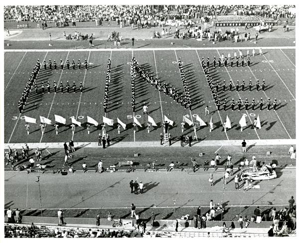 UCLA Marching Band march in formation of "FINE", Farewell to Clarence Sawhill at UCLA vs. USC game, 1971