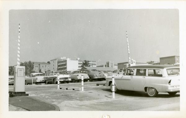 Car entering a parking lot, 1958