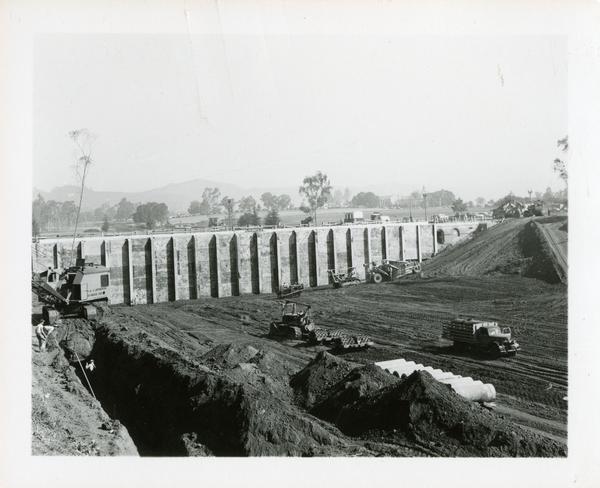 View of construction site of bridge acrross the deep arroyo