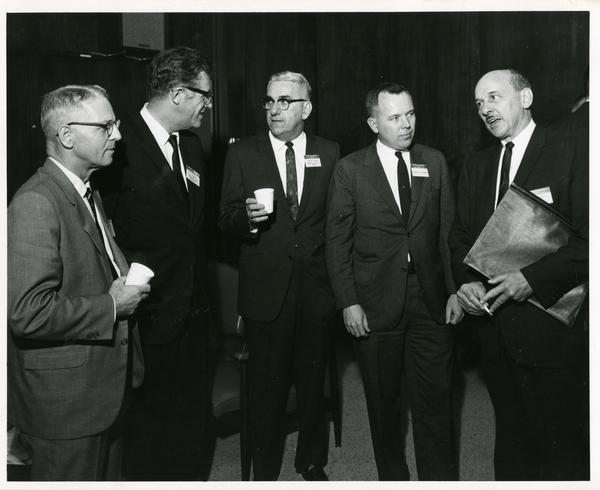 Participants in California Newspaper Publishers Seminar socializing, January 1966