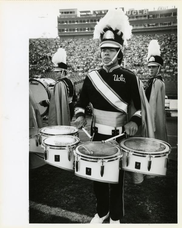 UCLA Marching Band drummer at football game
