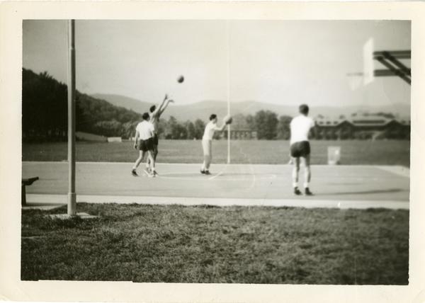 Men playing basketball, June 1943