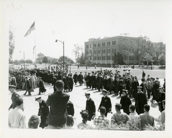 Procession stands outside of Royce Hall on Charter Day, 1950