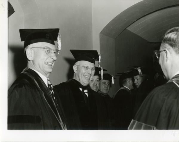 Earl Warren stands with other speakers on Charter Day 1954