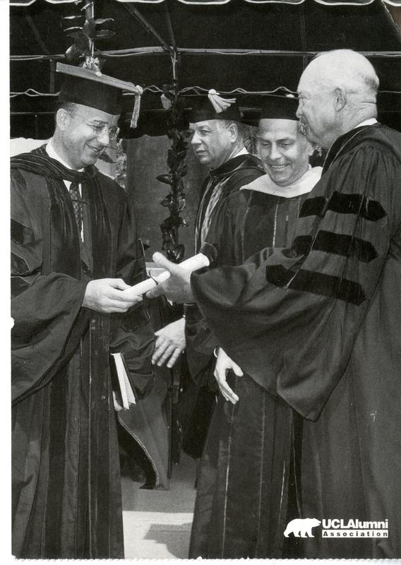 Former President Dwight Eisenhower receiving honorary degree from UC President Kerr and UCLA Chacellor Murphy, Charter day 1963