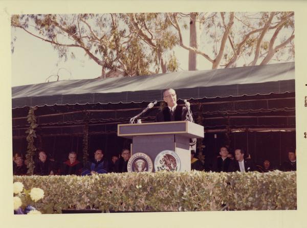 President Johnson speaks at podium on Charter Day 1964