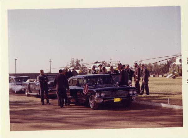 President Johnson entering car on arriving to UCLA campus for Charter Day 1964