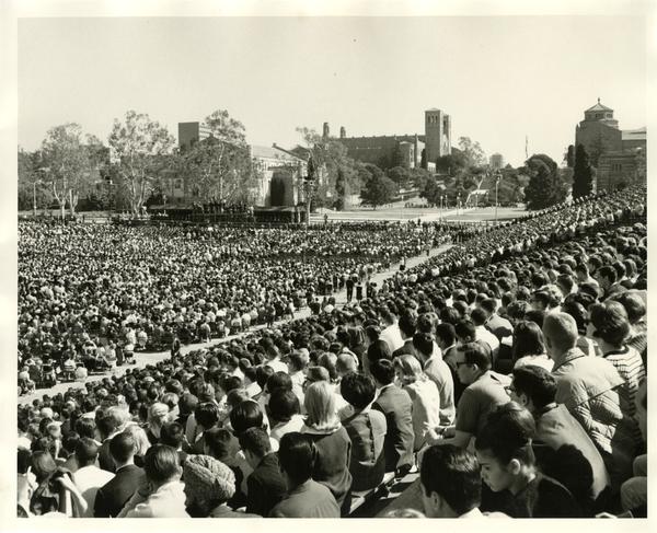 View of audience gathered in temporary stadium for Charter Day 1964