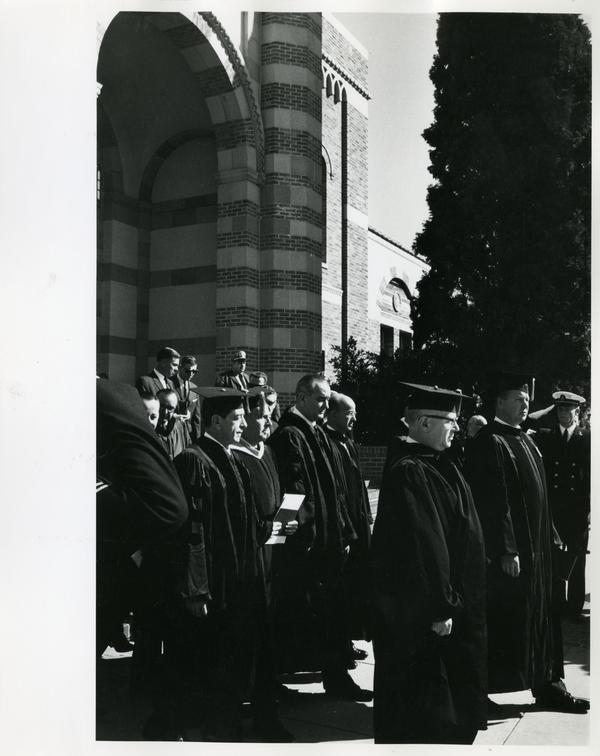 President Johnson walking with others on Charter Day 1964