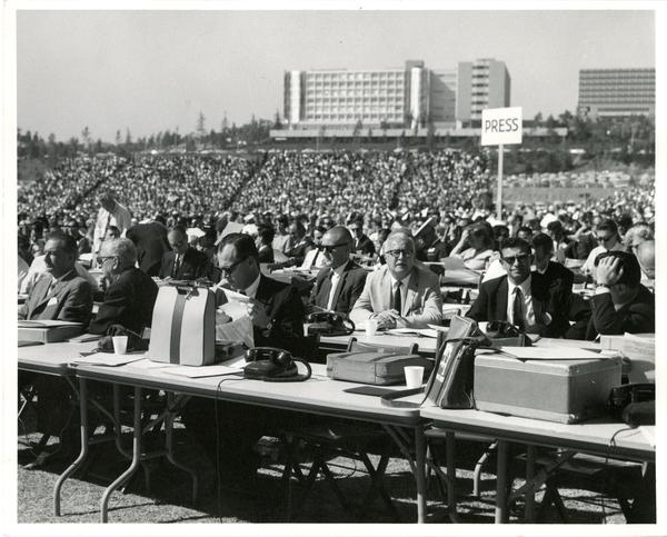 View of press section in temporary stadium on Charter Day 1964