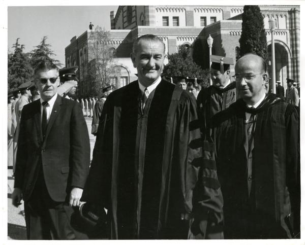President Lyndon B. Johnson walks next to U.C. President Clark Kerr on Charter Day, 1964