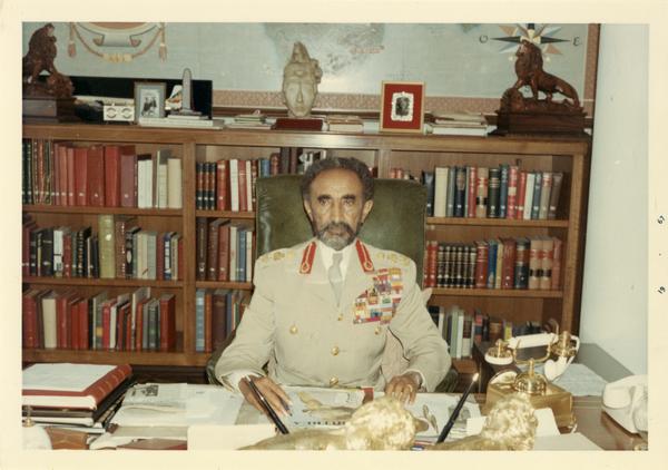 Emperor Haile Selassie of Ethiopia sitting at a desk, 1967