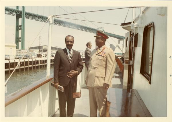 Two unidentified men aboard Motor Yacht Argo, 1967