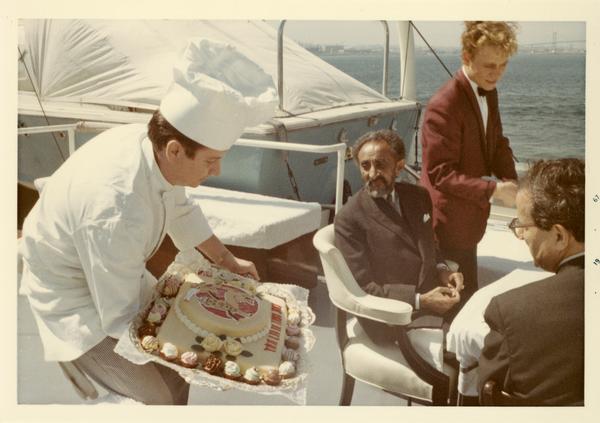 Chef presenting cake to Emperor Haile Selassie of Ethiopia, 1967