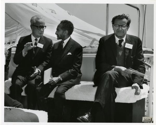 Emperor Haile Selassie talking with unidentified men aboard Motor Yacht Argo, April 25, 1967