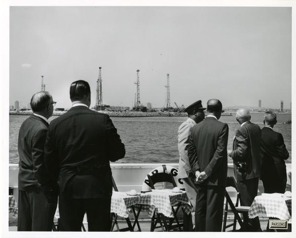Men look out on the water from Motor Yacht Argo, April 25, 1967