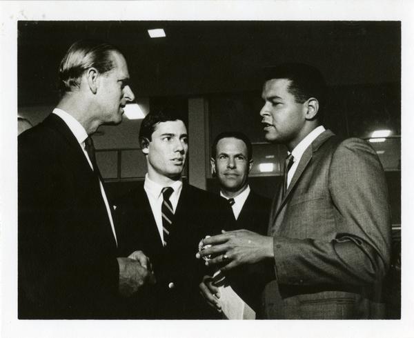 Prince Philip speaking with unidentified men on Charter Day, March 14, 1966