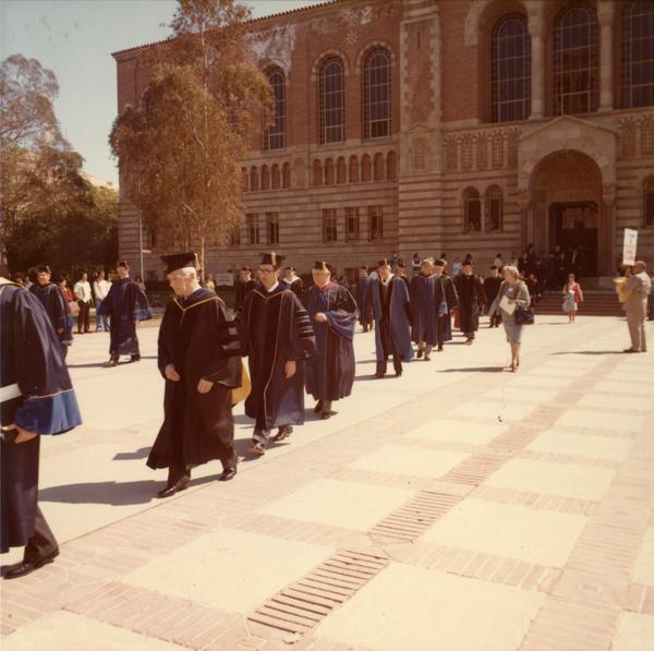 Academic procession in front of Powell Library on Charter Day, April 3, 1975