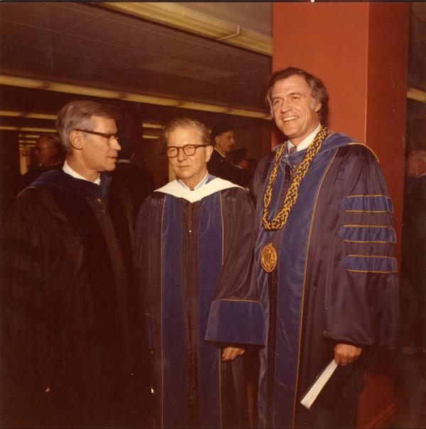 David Saxon, President Hitch, and Chancellor Charles Young pose for a picture on Charter Day, April 3, 1975