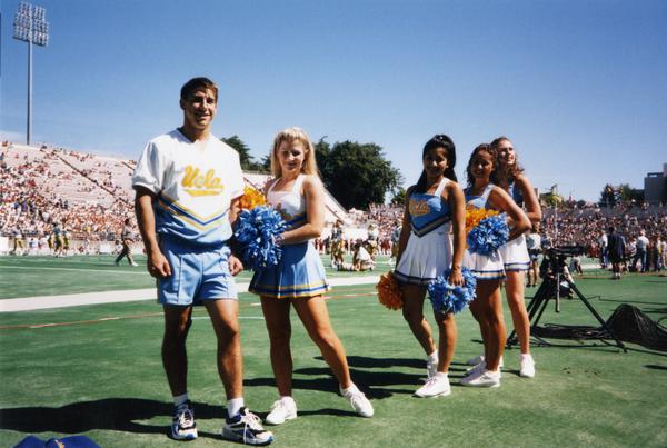 UCLA cheerleaders on the sidelines of football game