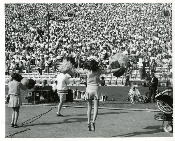 UCLA cheerleaders performing for the crowd at a football game