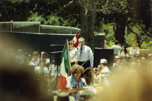 Speaker addresses the crowd at Chicano/a student rally, 1993