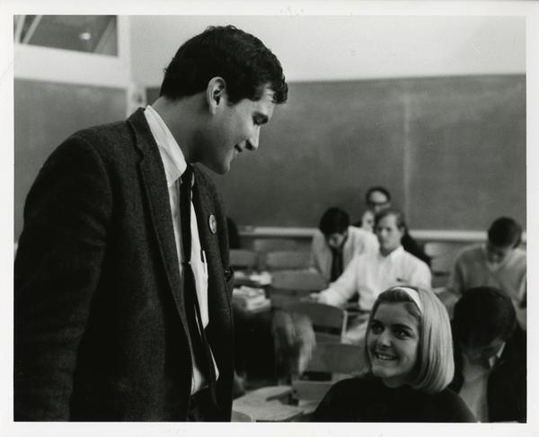 Instructor talking with student, circa 1965