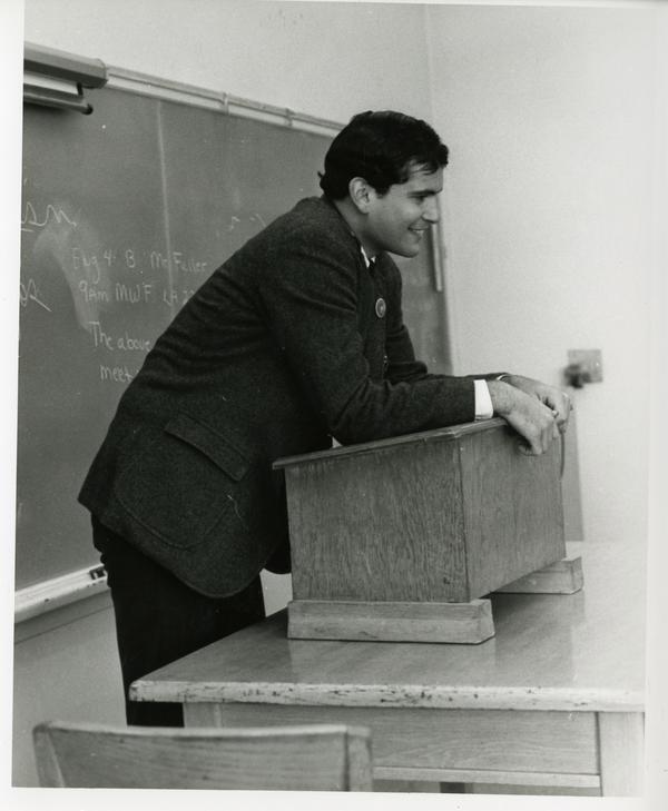 Instructor at a podium in front of the class, circa 1965