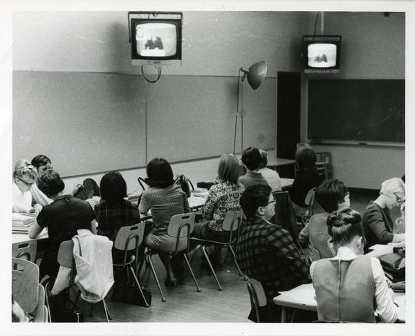 Students watching television in classroom, circa 1965