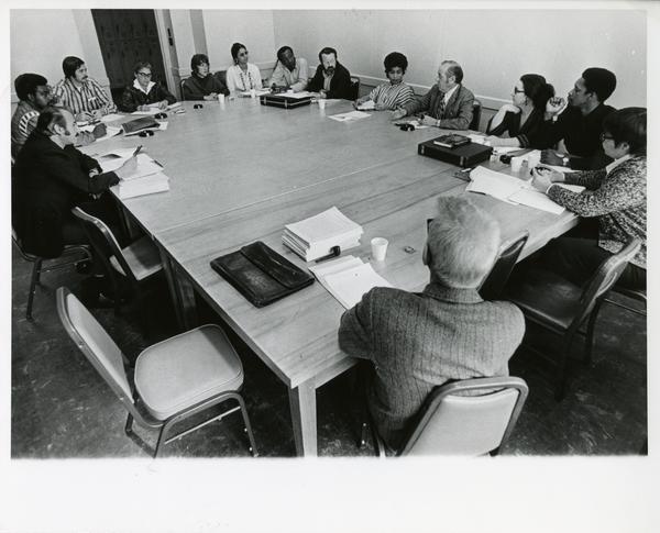 Students and faculty participating in doctoral seminar, circa 1980s