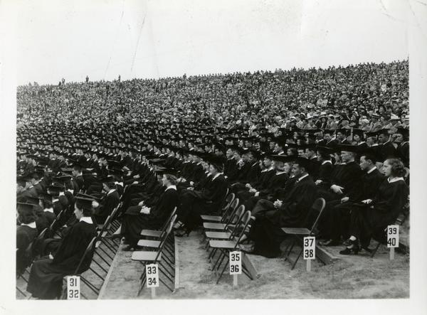 Graduates sitting in the audience at Commencement, circa 1940's