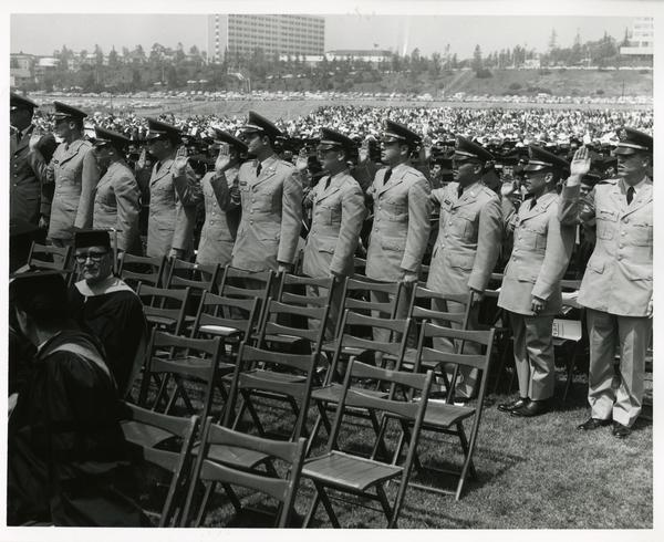 ROTC members standing at Commencement, 1964