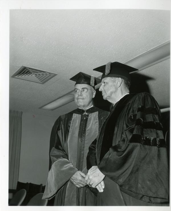 Faculty members posing for a picture at Commencement, June 9, 1966