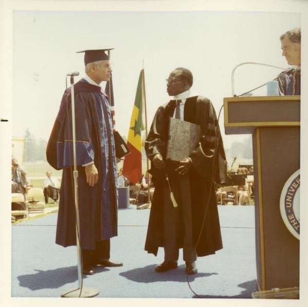 Man receiving his honorary degree at commencement, 1971