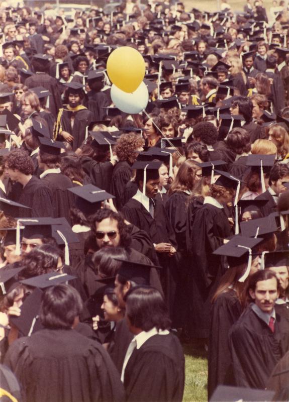 Crowds of graduates at commencement, 1975