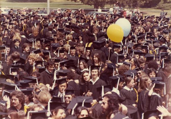 Crowds of graduates at commencement, 1975