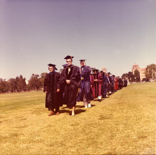 Graduates filing in for commencement, June 1976