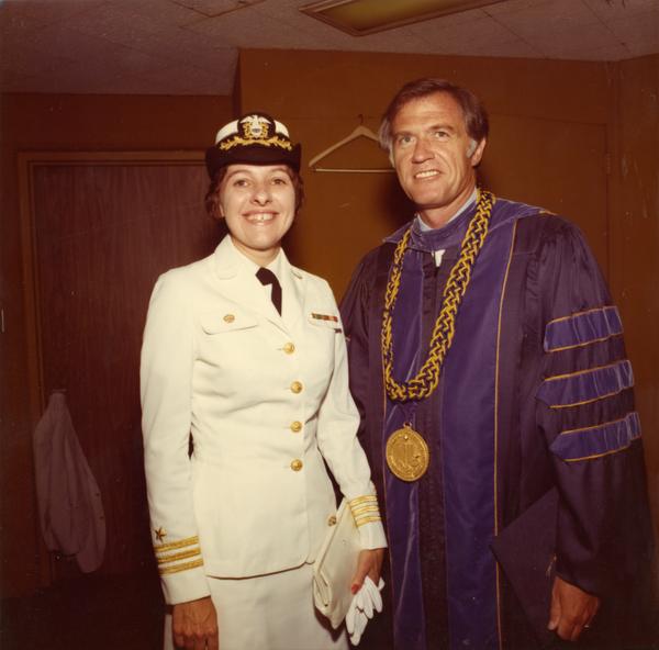 NROTC member Linda P. Richardson with Chancellor Charles E. Young at commencement, June 1976