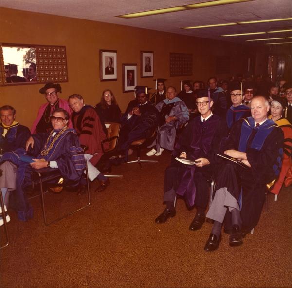 Members of the platform party waiting in the robing room, June 1976