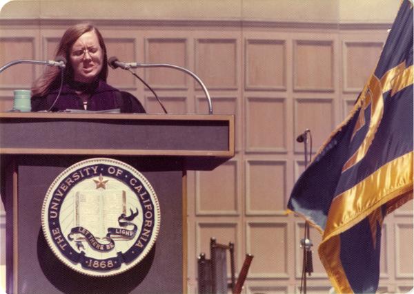 Darlene Walsh, graduate student speaker, addresses the crowds at commencement, June 1976