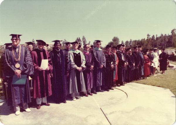 Platform party lined up for commencement, June 1976