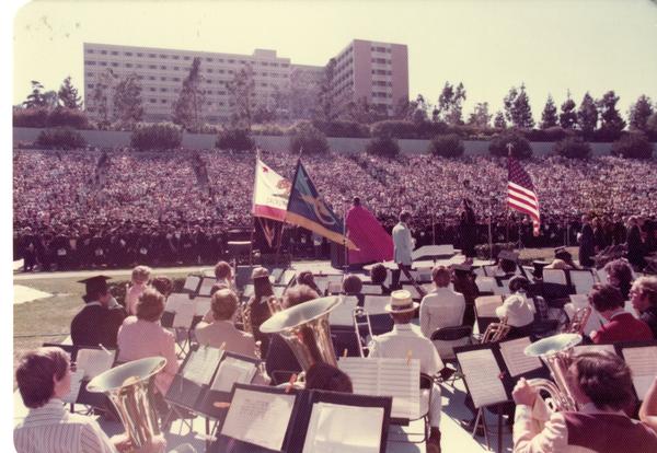 UCLA marching band performing at commencement, June 1976