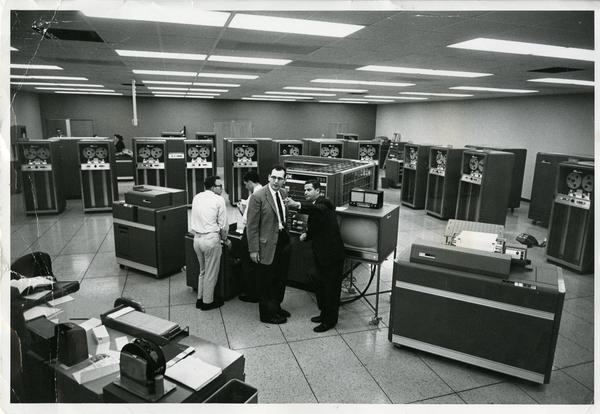 Workers in the lab of the Western Data Processing Center