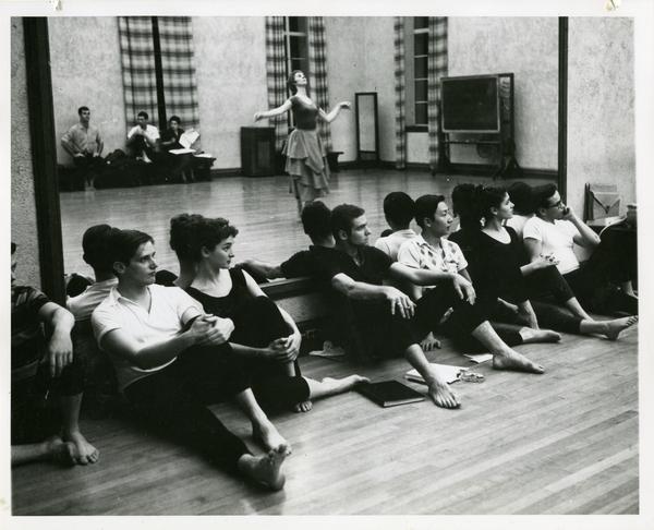 The cast of Theseus and Ariadne watching Carol Smith as the queen in her solo from the Prologue, 1959