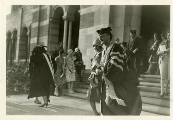 Guests walking down the steps of Royce Hall during the dedication of the Westwood campus, March 1930