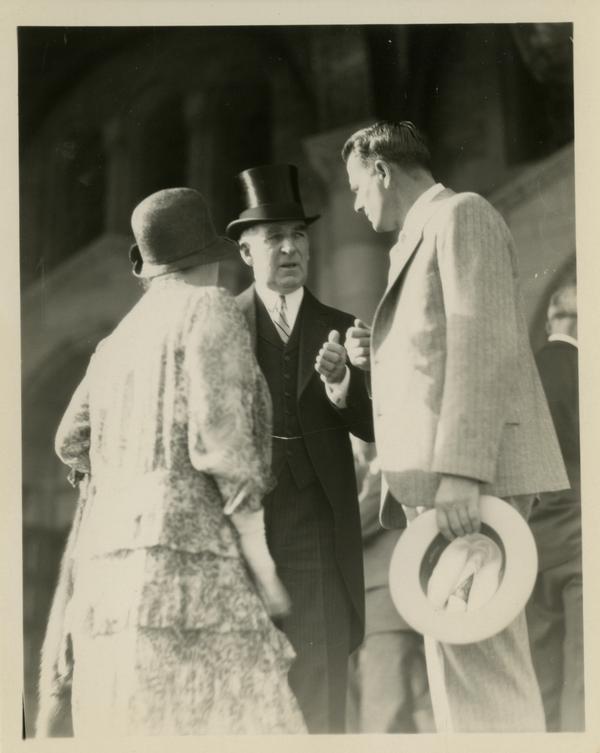 UC President William Wallace Campbell talking with two unidentified guests at the dedication of the Westwood campus, March 1930