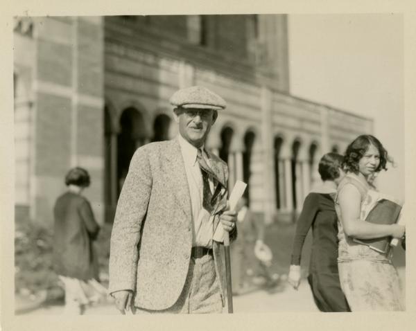 Unidentified guest exiting Royce Hall at the dedication of the Westwood campus, March 1930